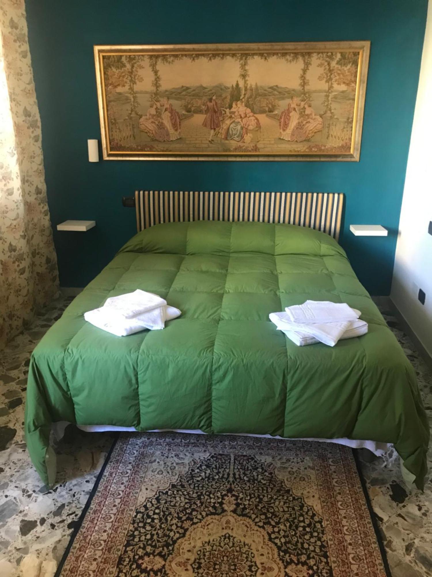 Camera Deluxe (2 Adulti + 1 Bambino)